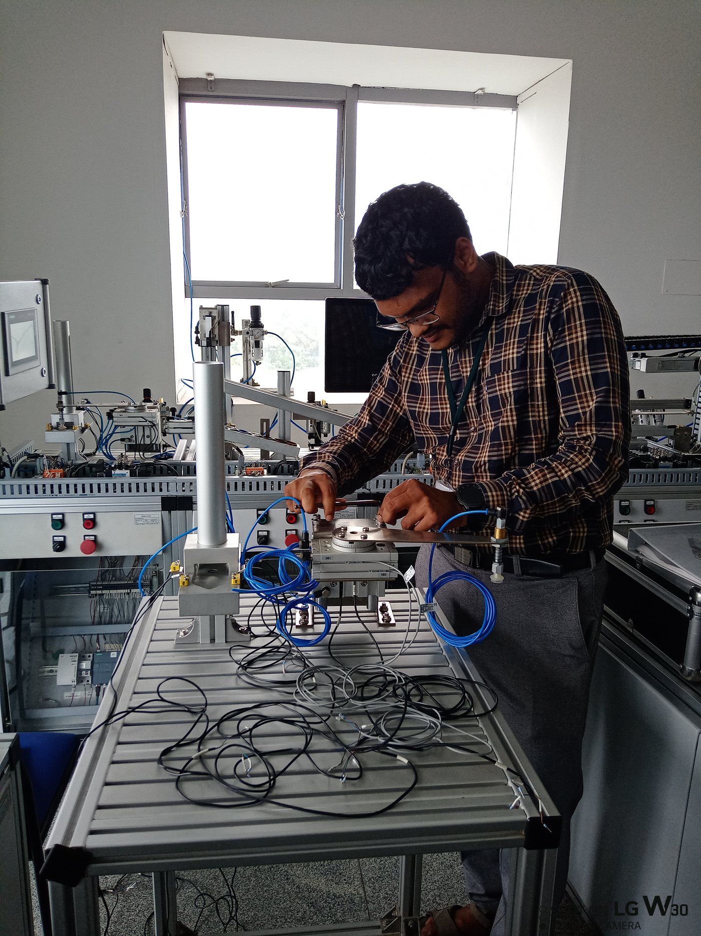 On the bench, working through a pneumatic circuit.